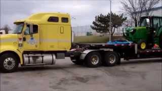 HAULING JOHN DEERE FARM TRACTORS