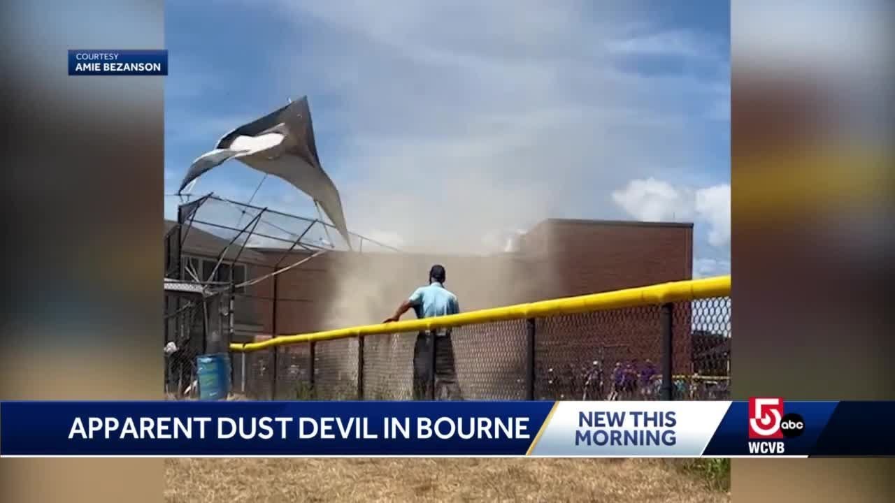 On camera: Dust devil whips through softball game