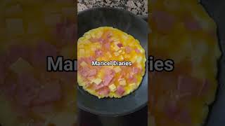 cheese, ham, and eggs omelette — fluffy eggs wrapped around melted cheese and savory ham.#breakfast