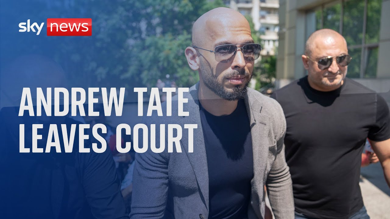 Andrew Tate leaves court in Romania