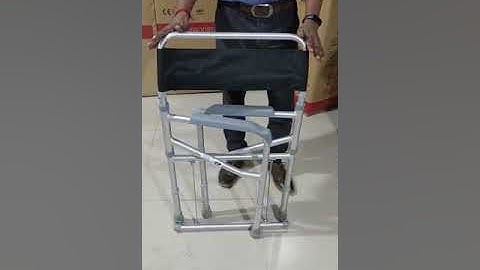 3 in 1 Vissco commode shower chair .