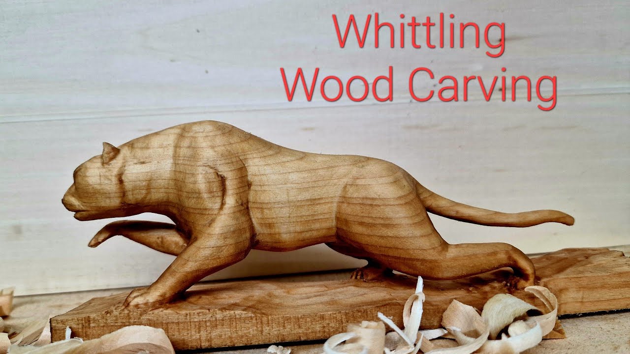 Whittling #Panther out of #wood #woodcarving 