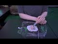Gently Rubbing Shaving Cream on an Apple Mic