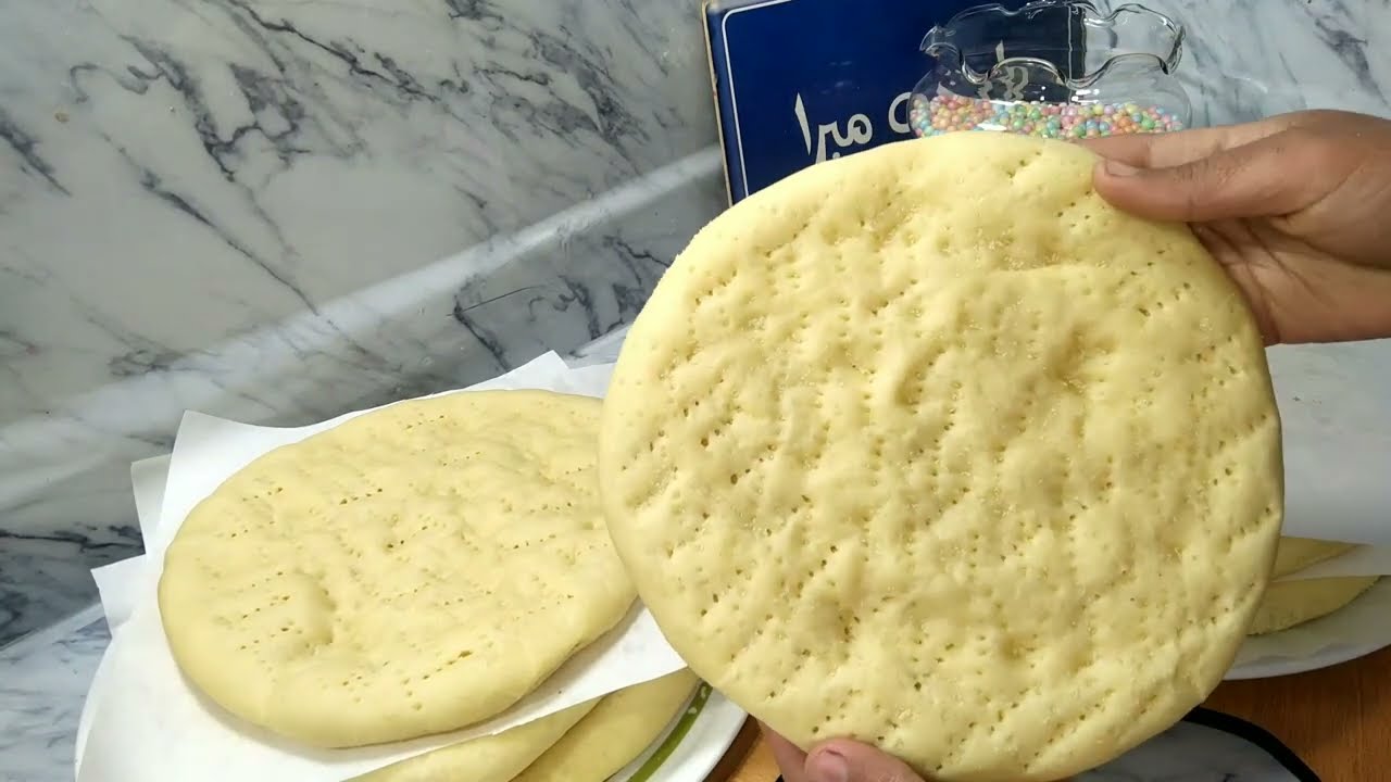 بيتزا مونجيني المفرزه 7  بيتزات بكيلو دقيق أعمليها ووفري فلوسك