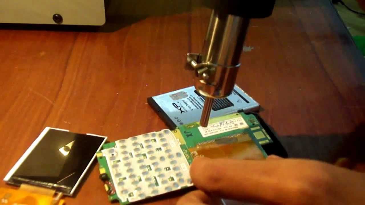 Mengganti LCD handphone XP 