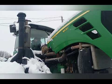 Video: Si ta hiqni timonin në një traktor lëndinë John Deere?