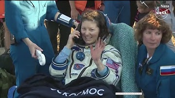 Astronauts return to Earth after longest stay on ISS