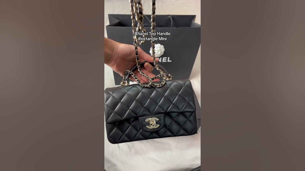 Close-up shots of the Chanel mini classic flap with top handle