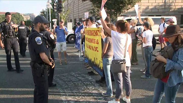 Climate protesters block traffic at major intersections through out D.C.