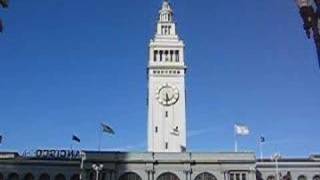 The clock tower chimes westminster quarters atop ferry building along
embarcadero at east end of market street in downtown san francisco.