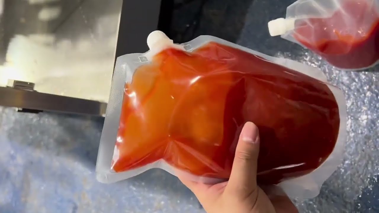 Linear spout pouch filling sealing machine ketchup liquid packaging equipment