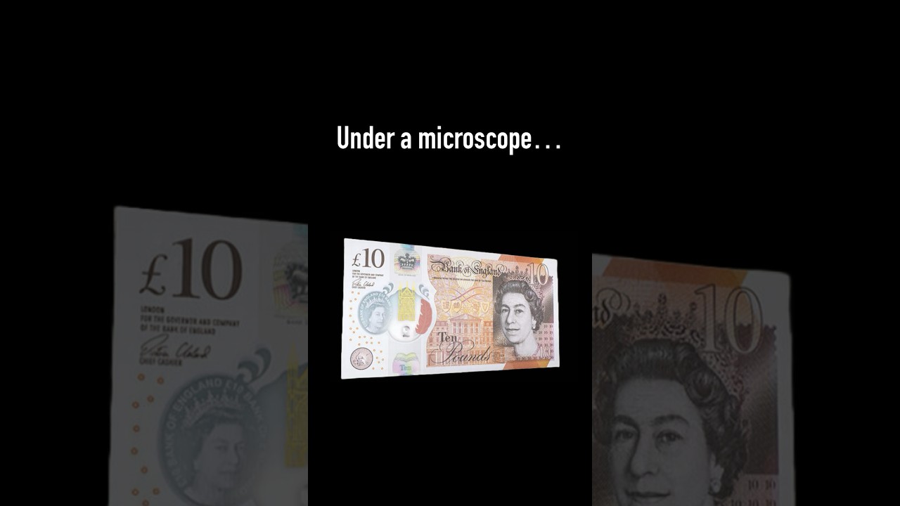 UK £10 Banknote Under Microscope Ten pounds Bank of England printed money tender 10 quid GBP note