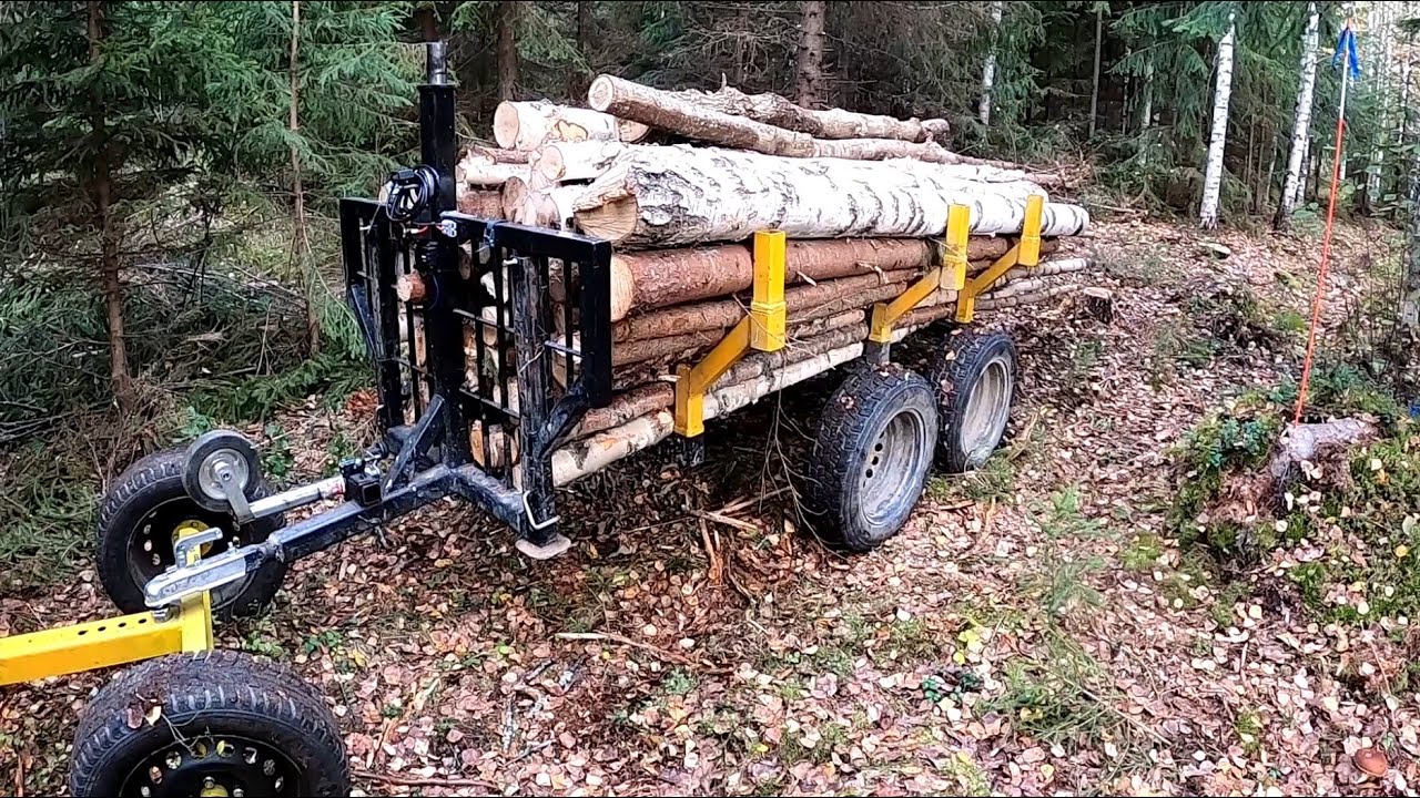 Testataan mönkijän dollyä kunnon puukuormalla