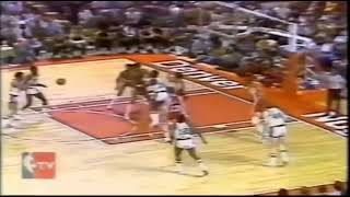 Willie Wise fakes out two defenders before hitting shot