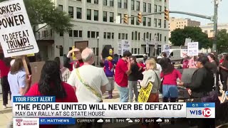 May Day rally at state house draws demonstrators calling for peace, higher wages
