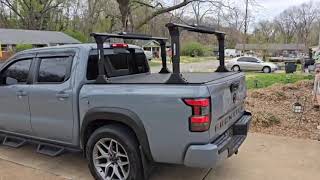 Truxedo Elevate adjustable Bed Rack installed Nissan Frontier with T-slots BAK Revolver cover