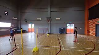 Badminton coach LES