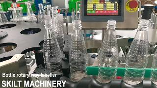 SKILT Auto 500ml round bottle rotary way labeling machine labeler label applicator