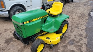 Showing my newly restored JOHN DEERE 316 garden tractor.