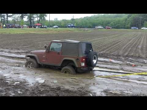 Guy Really stuck in the mud at Jeep Go Topless day...