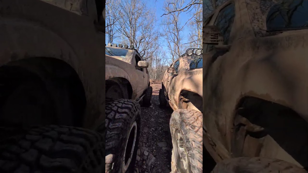 SAS Nissan Xterra and Pathfinder after playing in the rocks and mud!  