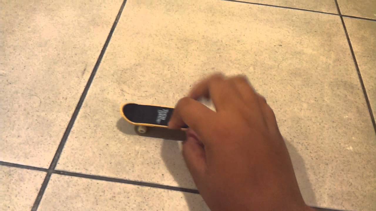 How to do an ollie with tech deck YouTube