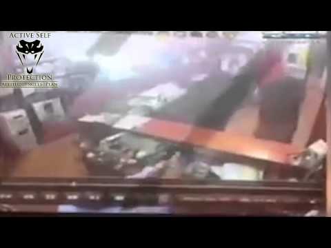 Store Owner Shoots Back At Armed Robbers