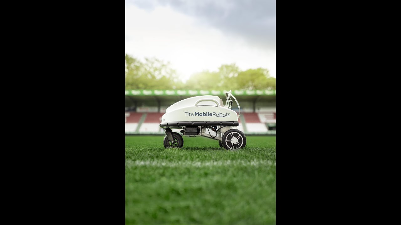 Tiny Mobile Robots Sports Field Grass Painter or What is the best way to paint a soccer field