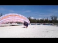 Tandem paramotor takeoff at the beach