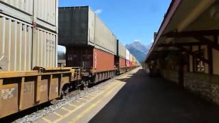 Two mile long double decker freight train runs through Banff