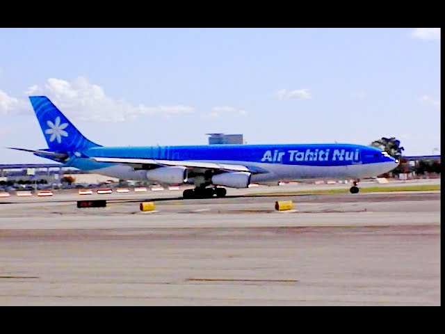 Air Tahiti Nui Airbus A340-300 arrives taxi departs Los Angeles