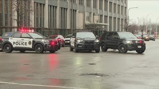 Police presence outside Erie County Court and Old County Hall in downtown Buffalo following two thre