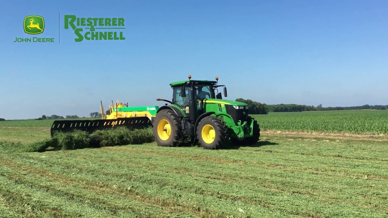 Merging Hay John Deere 7310R with Oxbo 2334 - YouTube