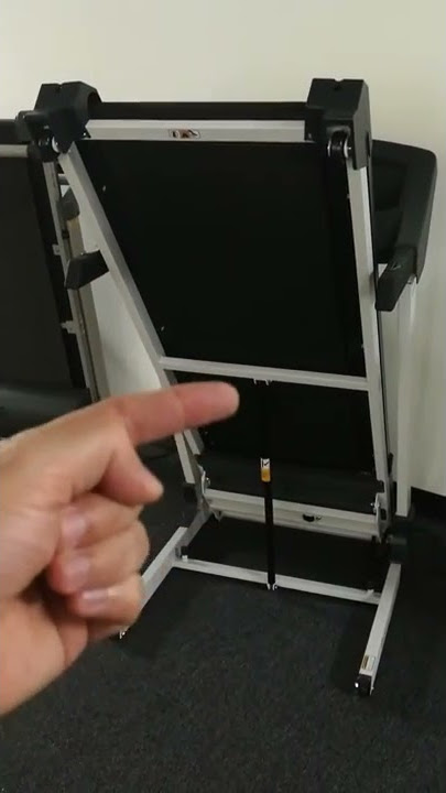 How a 'soft drop' folding system works on a treadmill