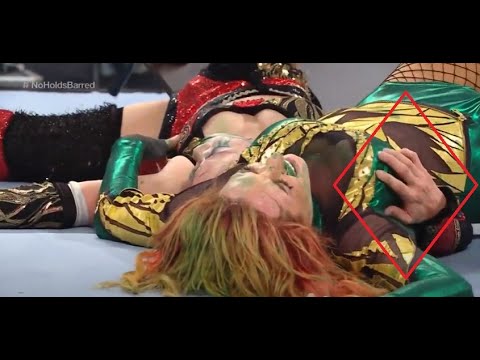 Asuka touching Becky's breast after going thru a table on Raw 07/04/22.