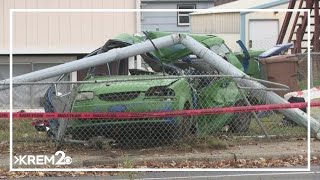 Woman hospitalized in critical condition after crashing into light pole near North Spokane post offi