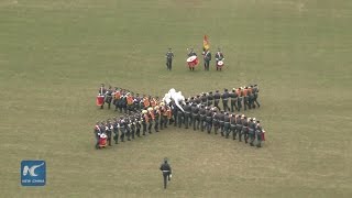 Military bands of argentina and 10 other countries staged a colorful
emotional parade through the streets buenos aires, as part
celebrations fo...