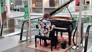 Menards piano player