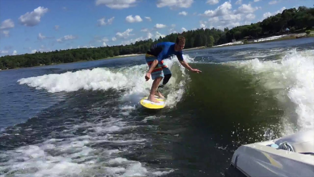 how to wakesurf behind ski boat - youtube