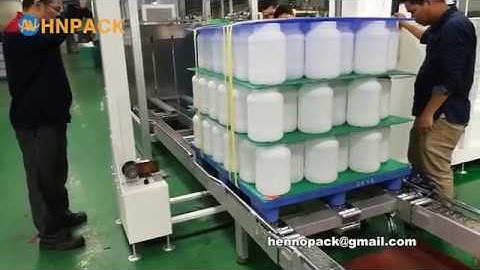 Hennopack in line pallet vertical type strapping machine system