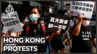 About 290 people were arrested by hong kong police as riot officers
swooped on pro-democracy protesters - opposed to the postponement of
local legislativ...