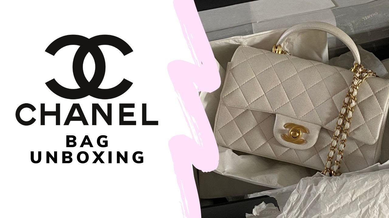 chanel bag with chanel written on strap