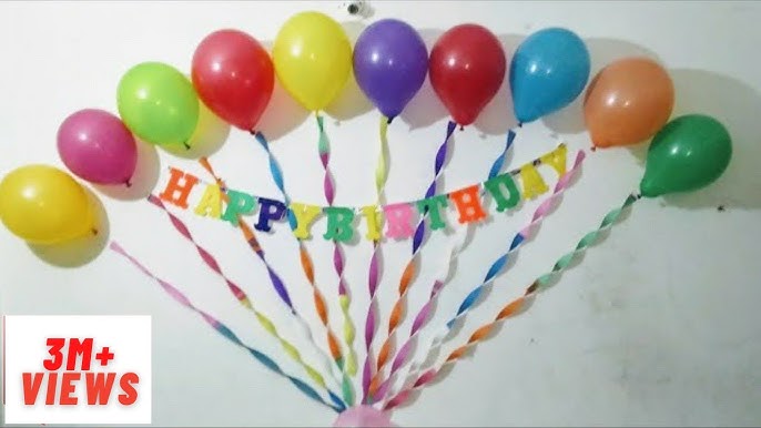 Happy birthday with balloons and ribbon decoration