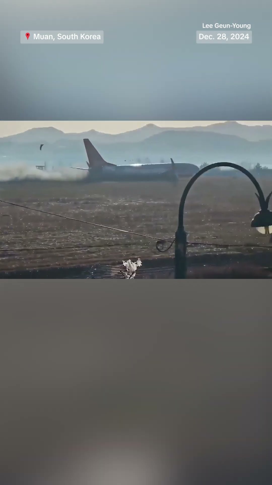 Airplane veers off runway and crashes at South Korea airport