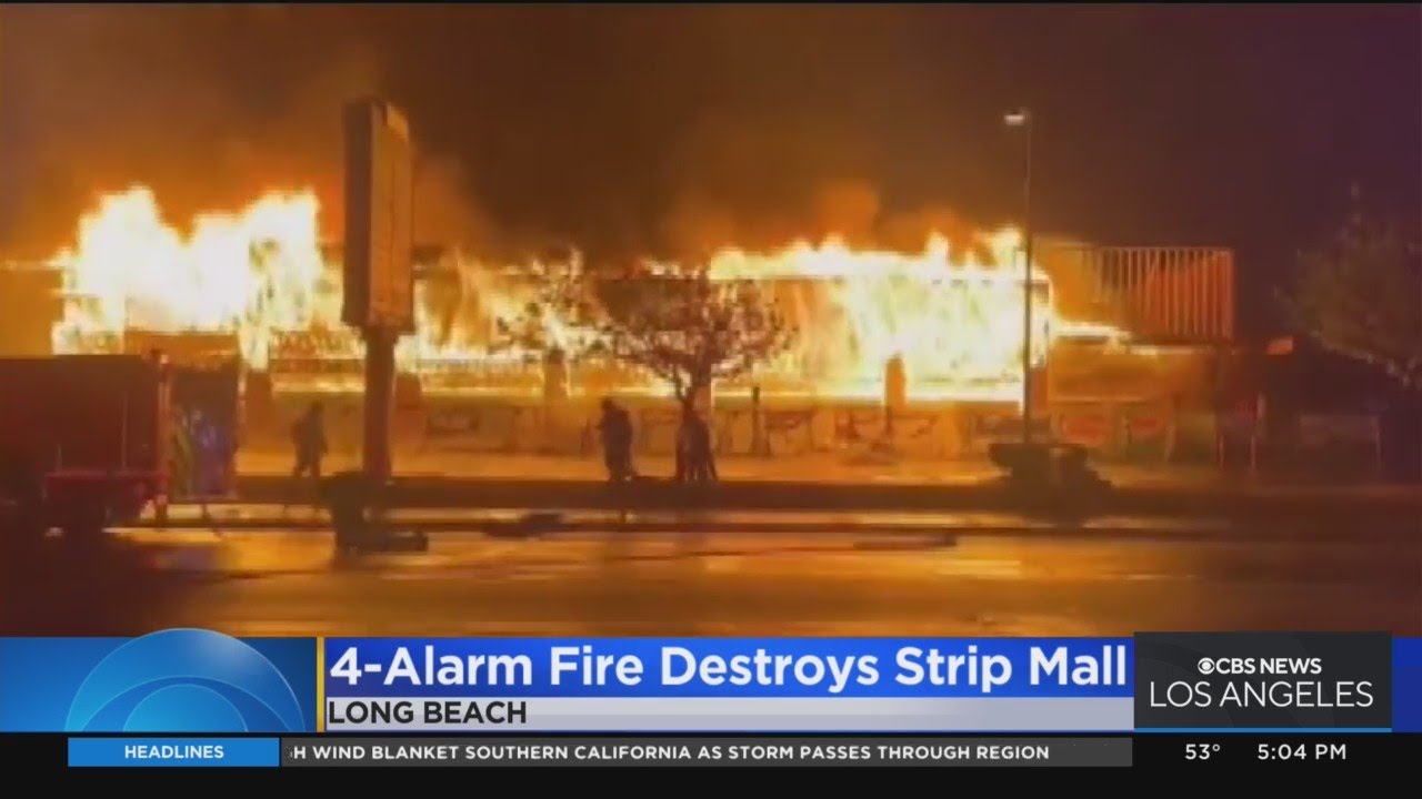 Four-Alarm fire rips through vacant strip mall in Long Beach