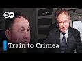 Putin opens railway bridge connecting Russia and Crimea | DW News