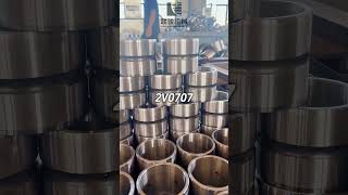 Precision bucket pin bushes with multiple surface treatments.