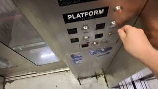 Mongrain hydraulic glass elevator at the Utica Avenue A C station Brooklyn NY