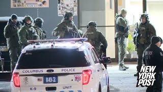 Scene at an Ohio cosmetics warehouse where a targeted shooting killed one, injured five