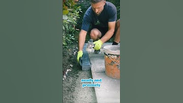 man is leveling the ground using manual tools #shorts #feedshorts #construction